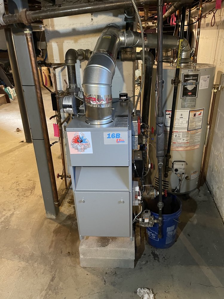 Heating expert installing boiler in Woodland Park