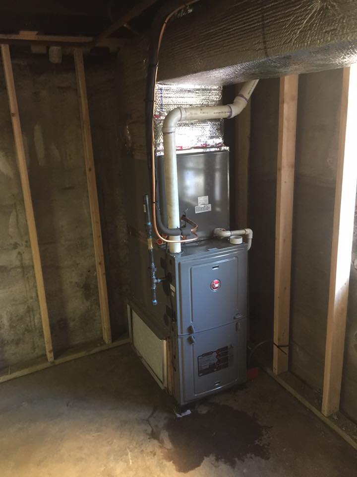 M&S technician performing furnace tune-up in Woodland Park NJ