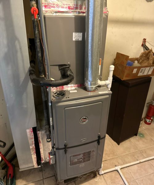 Leaking water heater being repaired – Woodland Park NJ