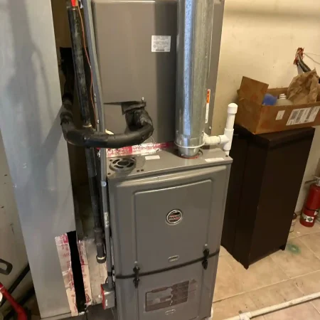 Leaking water heater being repaired – Woodland Park NJ