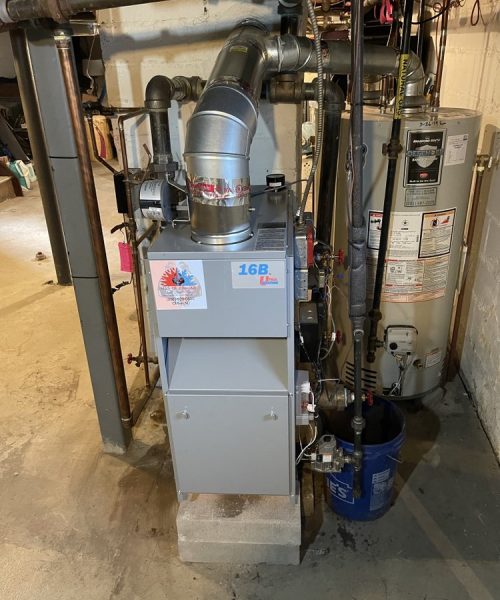 Heating expert installing boiler in Woodland Park